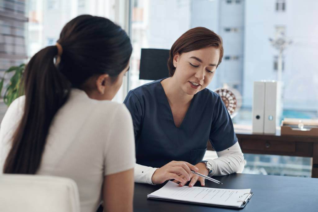 A person consulting with a healthcare professional