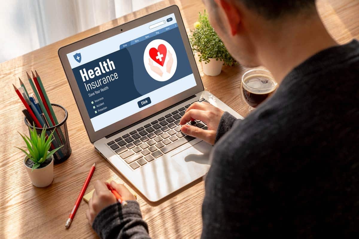 A person looking at their health insurance online
